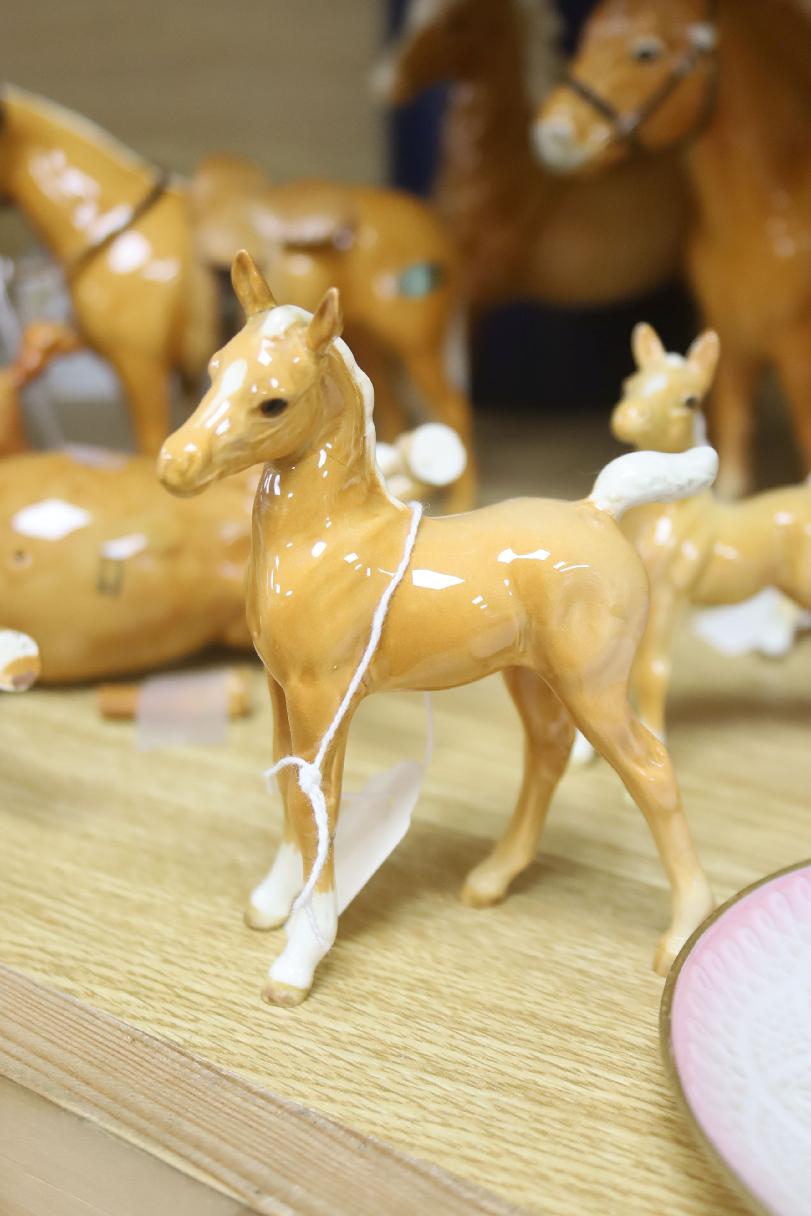 Eight Beswick Palomino horses